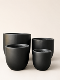 Black matte fiber clay plant pot set, four round pots in nesting sizes