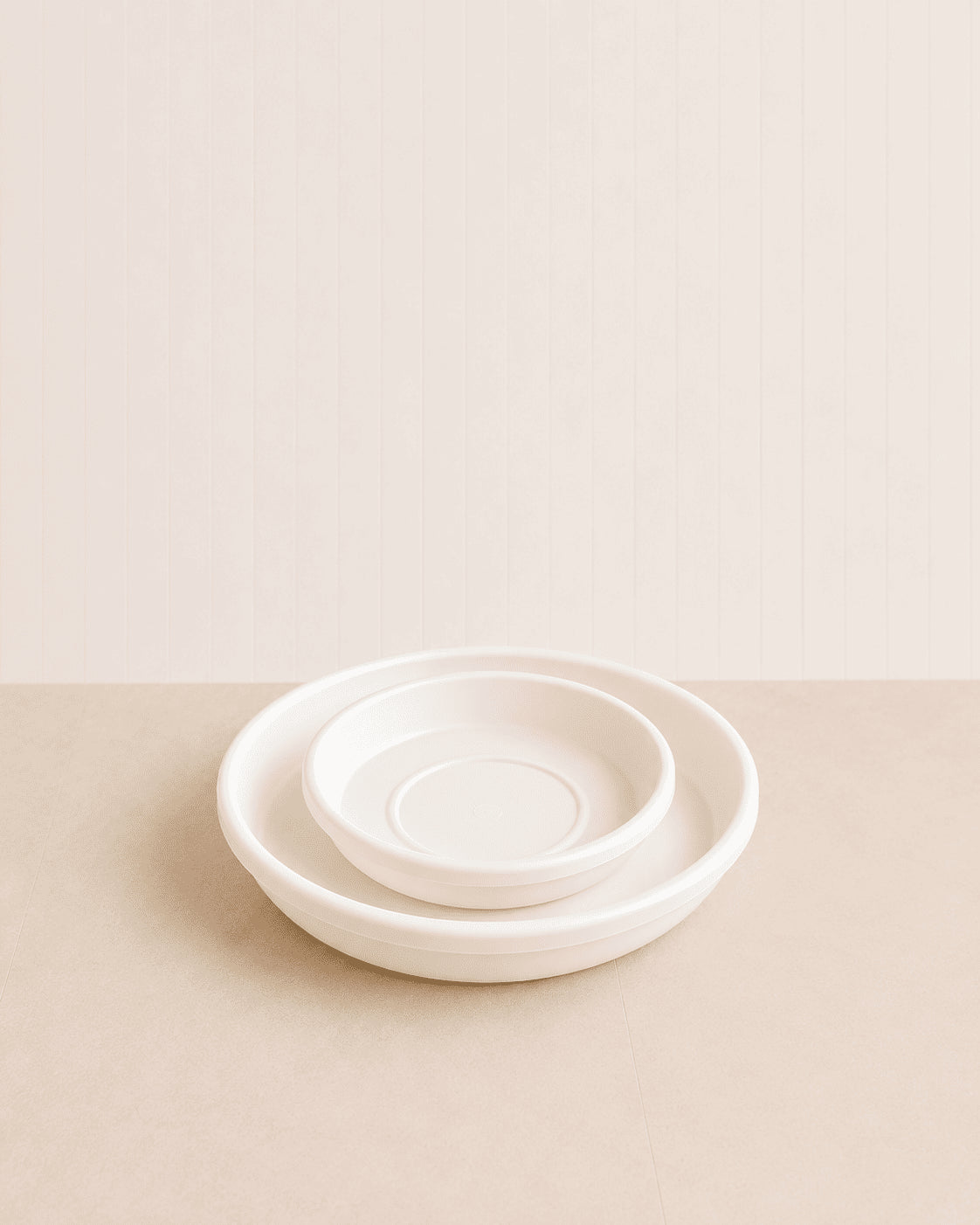 White round ceramic saucer, shallow dish with raised rim