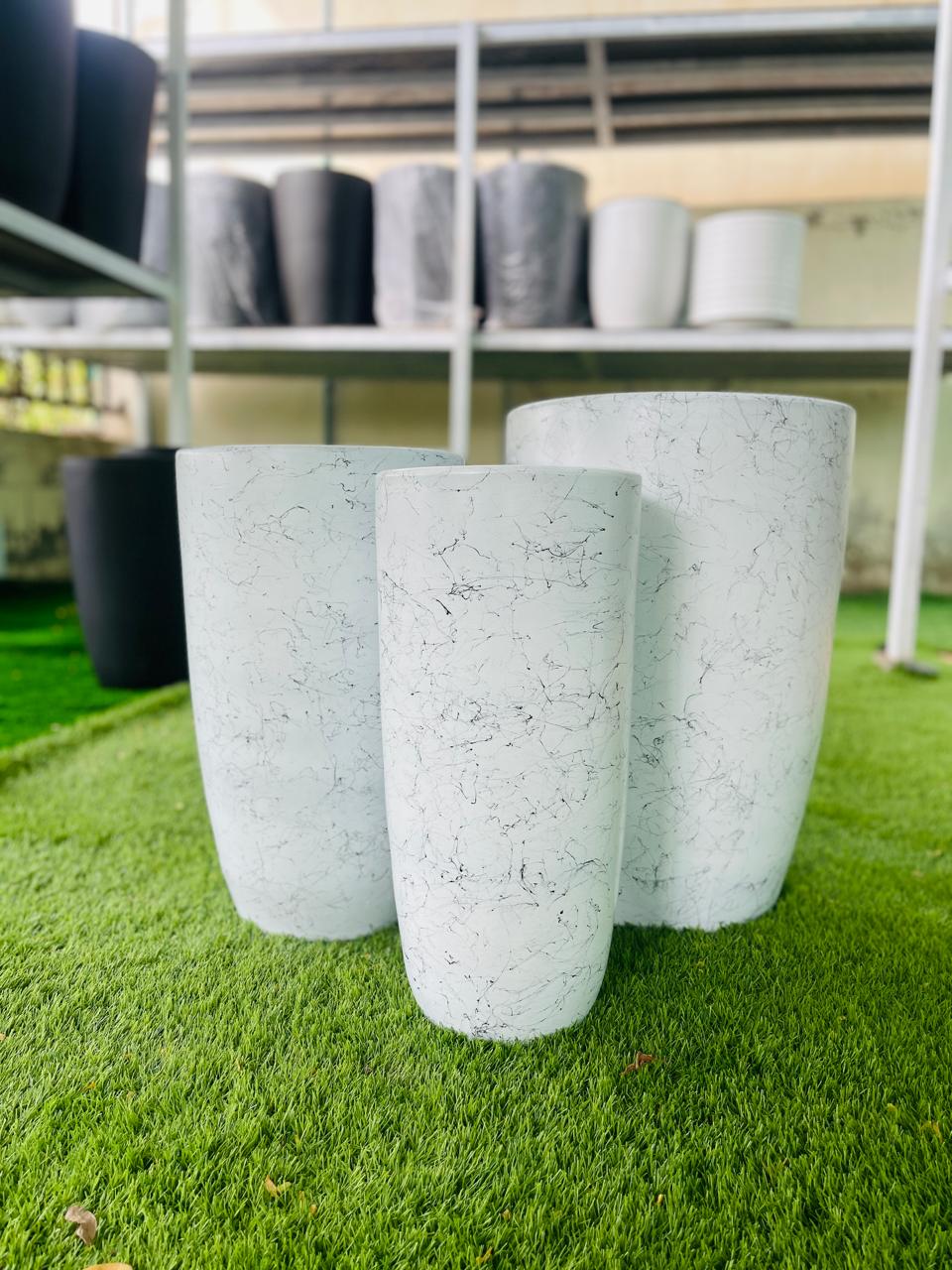 White ceramic tall pot with marble-pattern gray veining