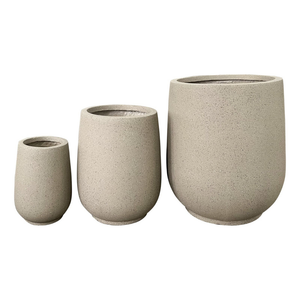 Sand-colored round planters set, speckled concrete look, three sizes.