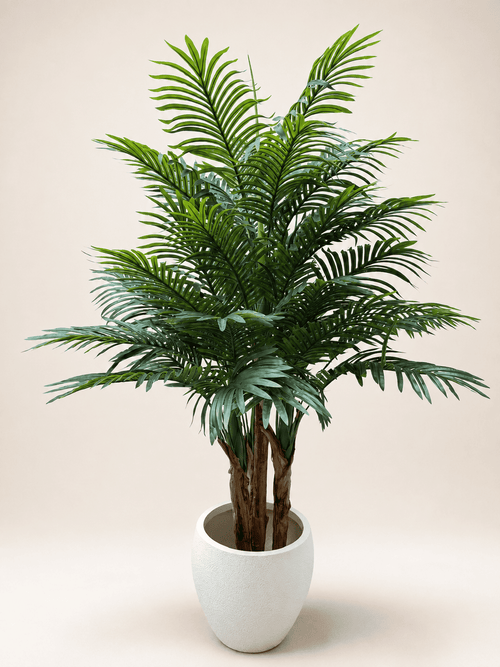 Artificial Kentia palm with green fronds in a white pot