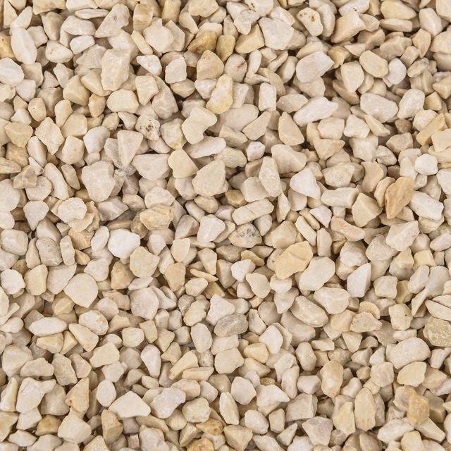Beige gravel stones with loose, textured bulk surface