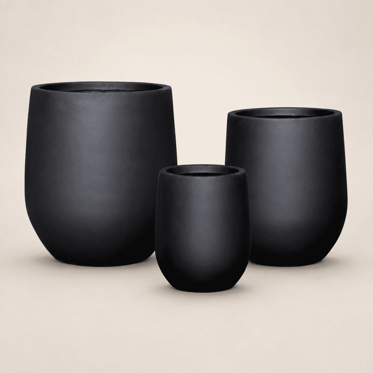 Matte black round planters, set of three nesting bowls