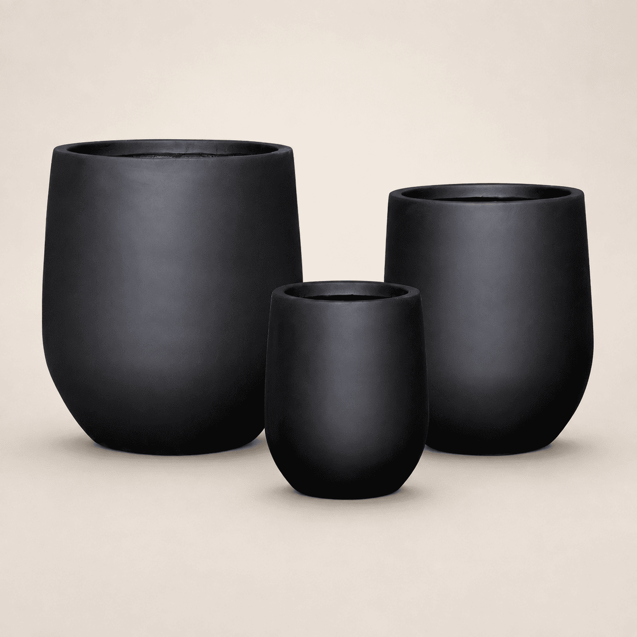 Matte black round planters, set of three nesting bowls