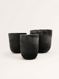 Set of 3 black ribbed ceramic low pots with wide rims