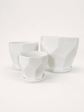 White ceramic low pots set of three, square-cut profile, open top.