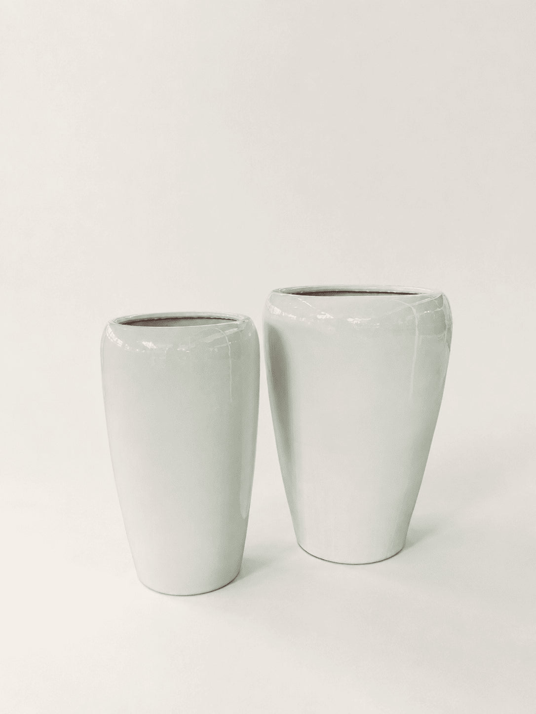 Glossy white ceramic tall pots, tapered cylinder shape, set of two