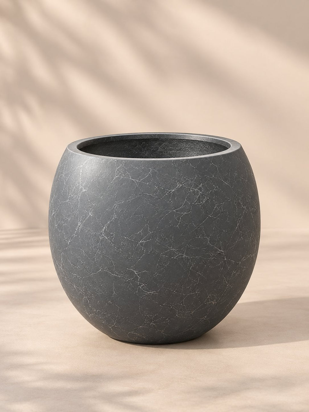 Close-up of Crackle Globe Planter showing the marble-look crackle finish
