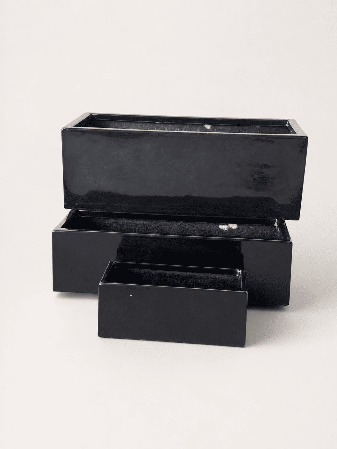 Rectangular black fiberglass pot with open lid and inner tray