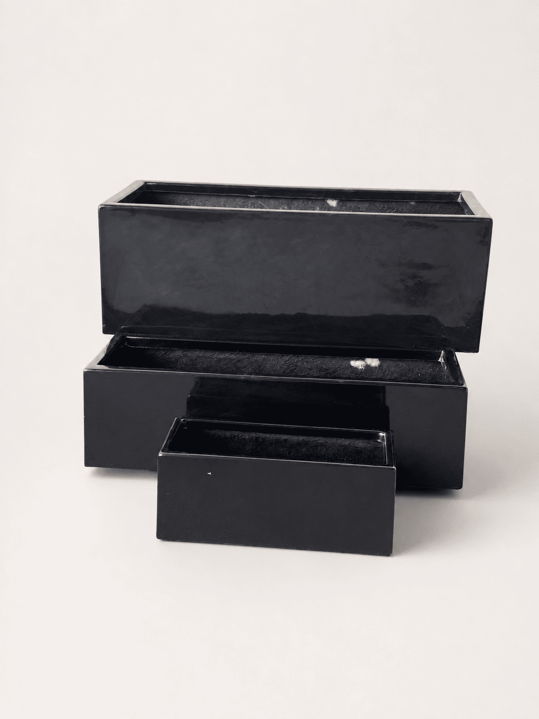 Rectangular black fiberglass pot with open lid and inner tray