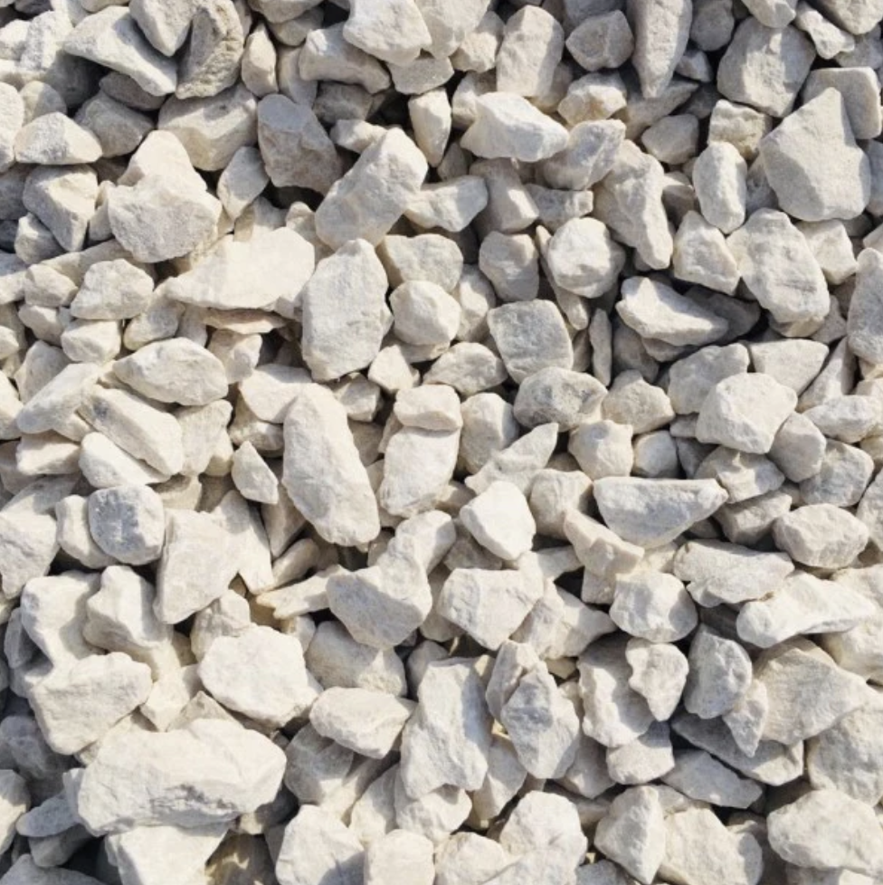 Off-white gravel, pale irregular landscaping stone, sold by the truck load in Dubai