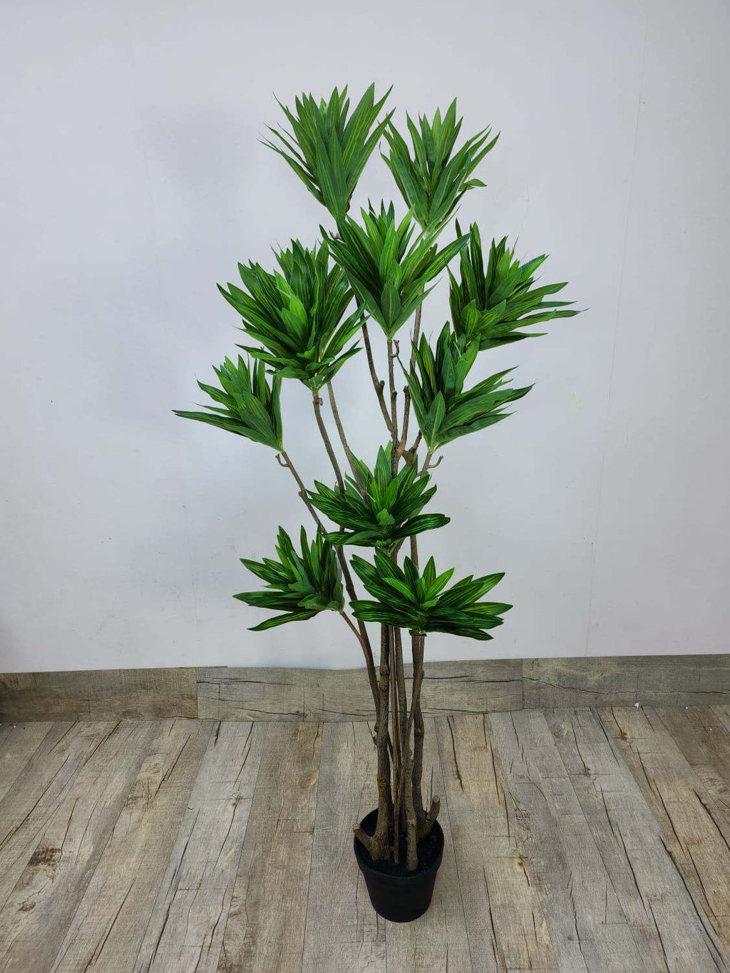 Artificial Dracaena marginata tree in black pot with green spiky leaves