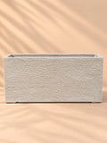 Ribbed Stone Rectangular Planter in beige with limestone-look ribbed texture